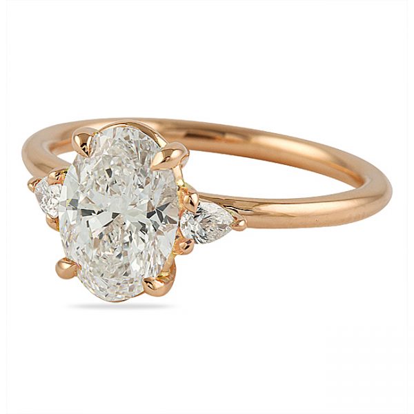 18ct Yellow Gold Trilogy Oval And Pear Shape Diamond Engagement Ring.